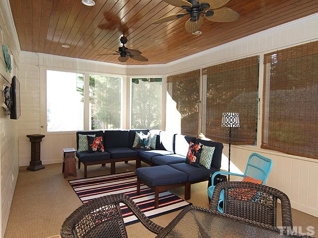 1508 Wood Spring Court Raleigh, NC 27614 - Photo 21 of 25 a living room with furniture and a large window