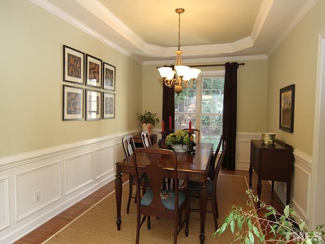1508 Wood Spring Court Raleigh, NC 27614 - Photo 5 of 25 a view of a dining room with furniture and chandelier