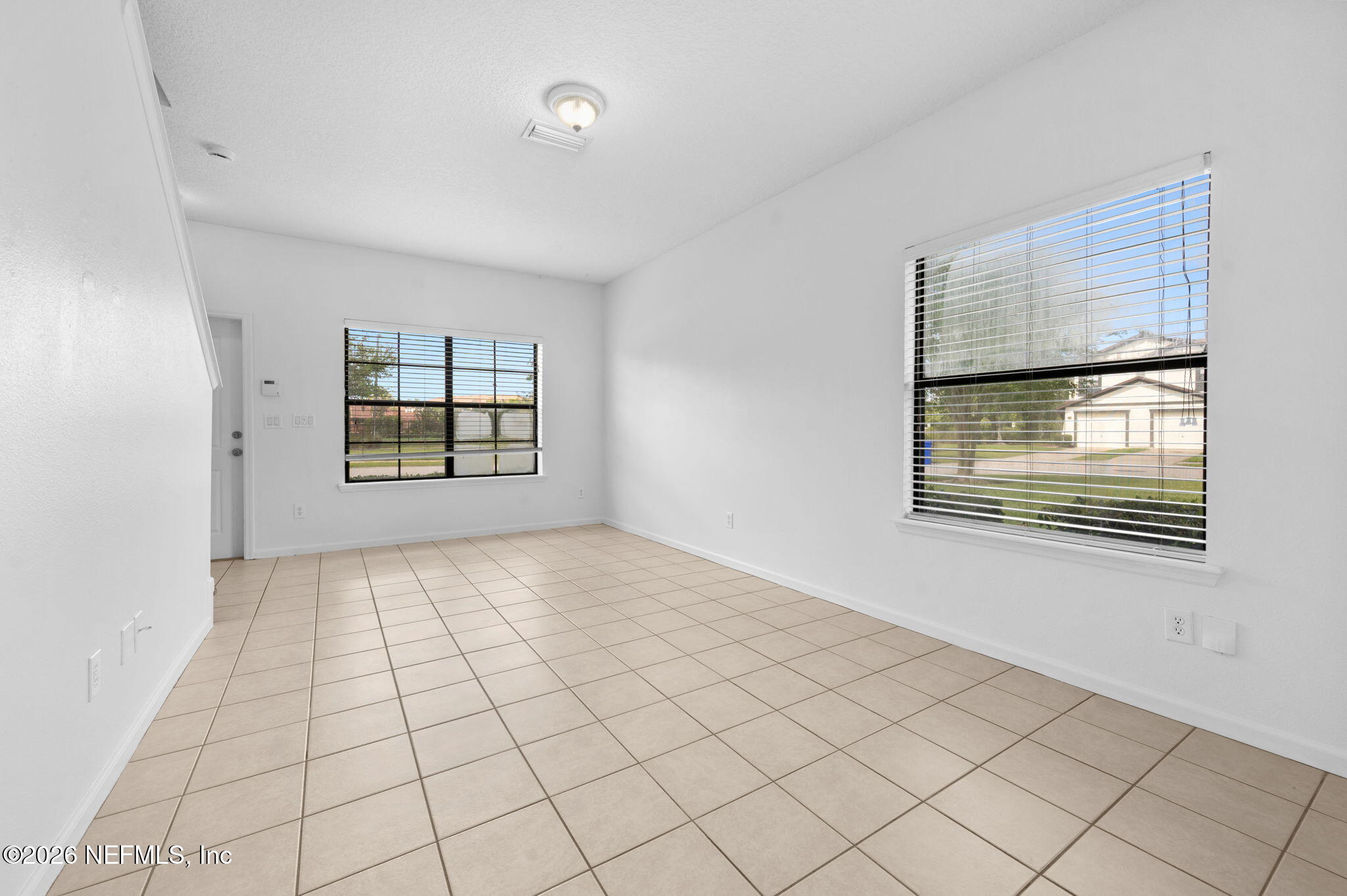 253 Syrah Way St. Augustine, FL 32084 - Photo 6 of 39 a view of an empty room and window