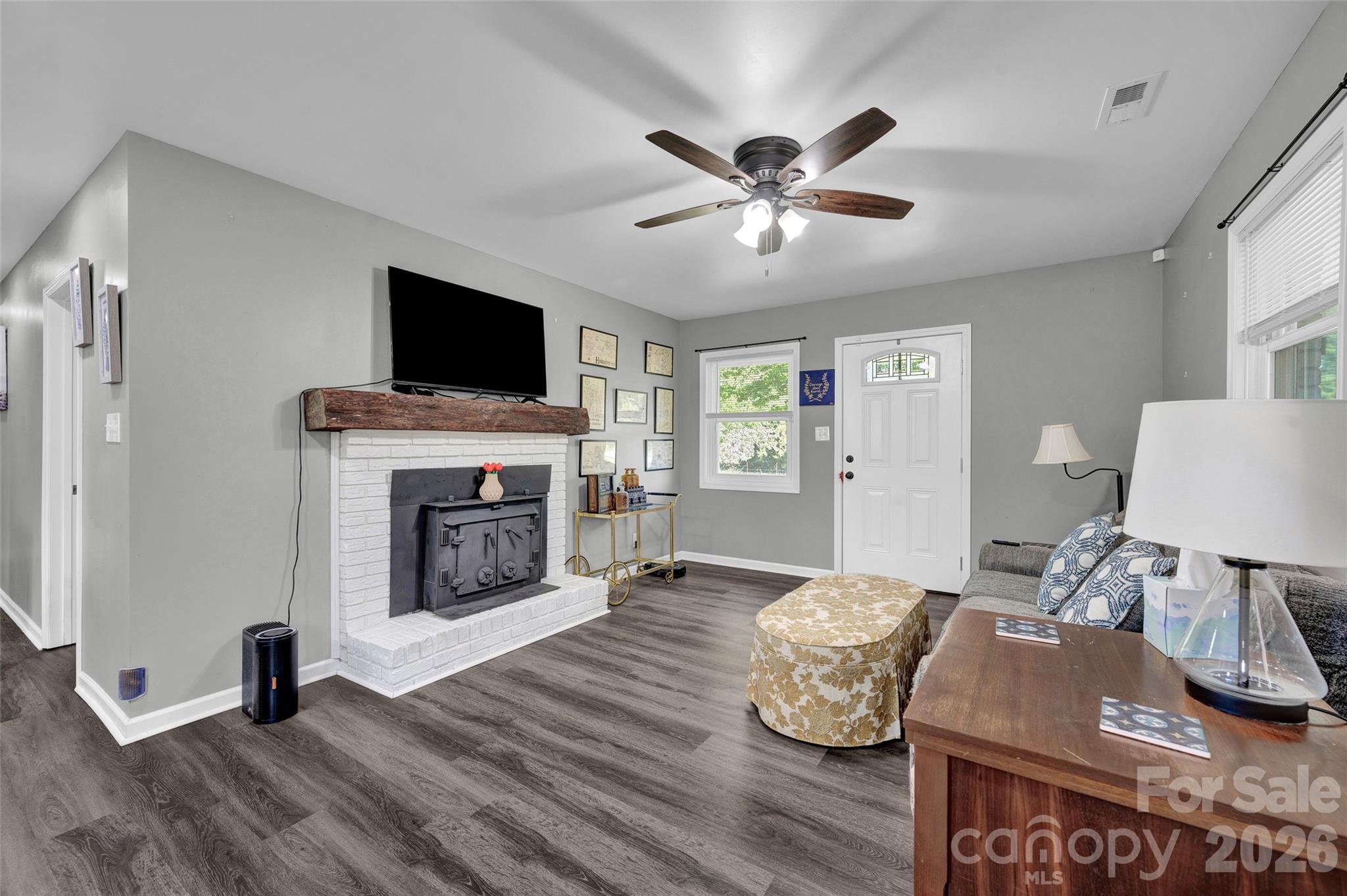3033 West Highway 10 Conover, NC 28613 - Photo 10 of 26 a living room with furniture and a fireplace