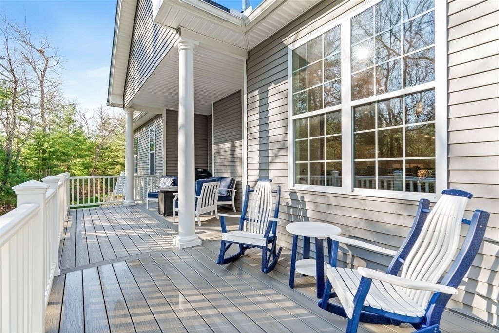 61 Ridgewood Drive Stow, MA 01775 - Photo 30 of 31 a view of a outdoor space with a lounge chair