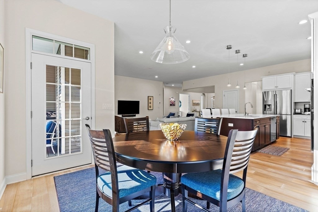 61 Ridgewood Drive Stow, MA 01775 - Photo 7 of 31 a view of a dining room with furniture
