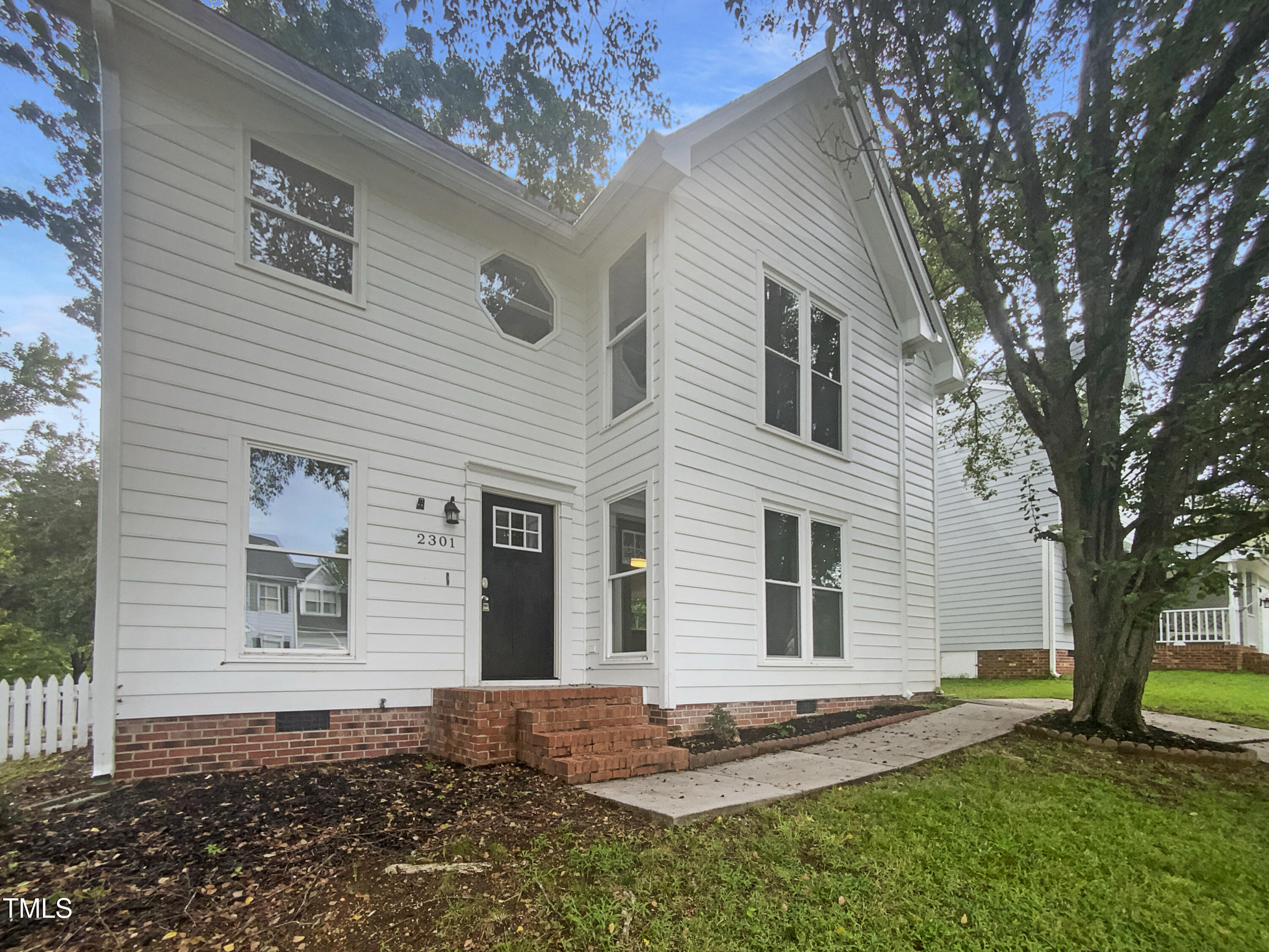 2301 Declaration Drive Raleigh, NC 27615 - Photo 1 of 19 a front view of a house with a yard