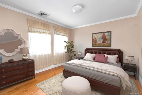 a bedroom with a bed and window