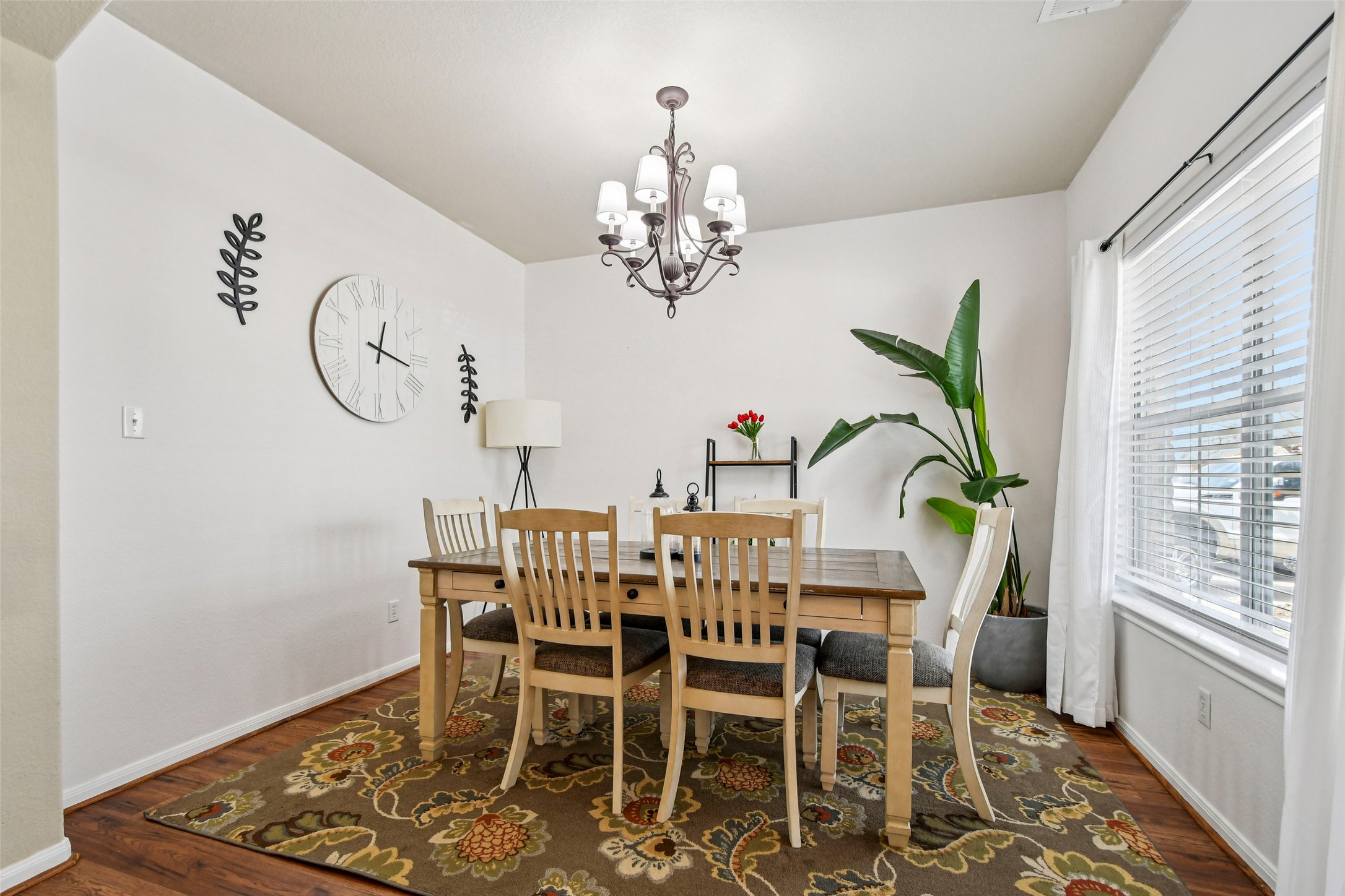 410 Rosedale Boulevard Georgetown, TX 78628 - Photo 15 of 34 Dining room featuring dark wood-style floors and hanging lights; can dou