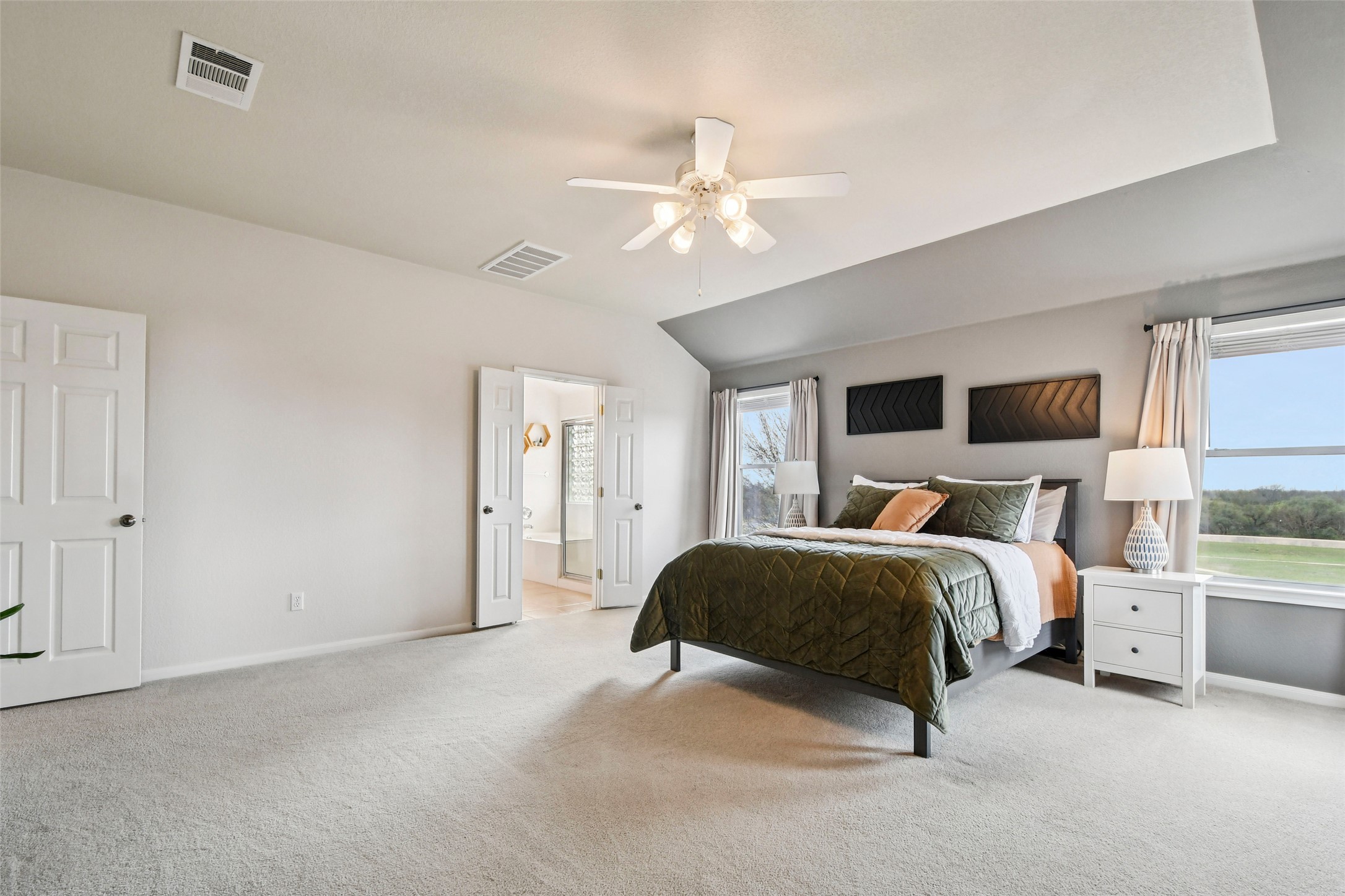 410 Rosedale Boulevard Georgetown, TX 78628 - Photo 22 of 34 Large primary bedroom with elevated backyard views