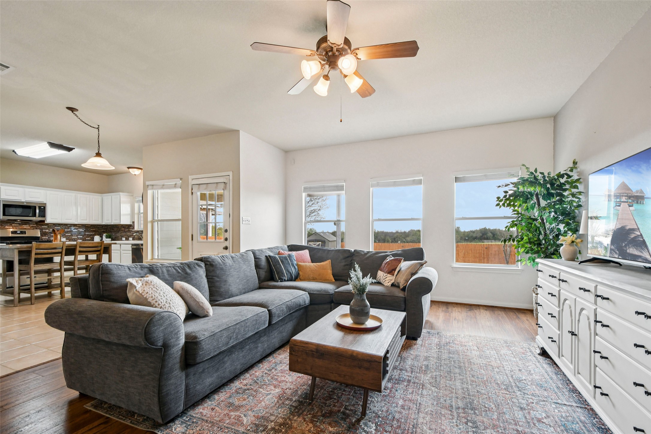 410 Rosedale Boulevard Georgetown, TX 78628 - Photo 5 of 34 Spacious living area with large windows and natural light