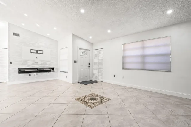 a view of an empty room with window