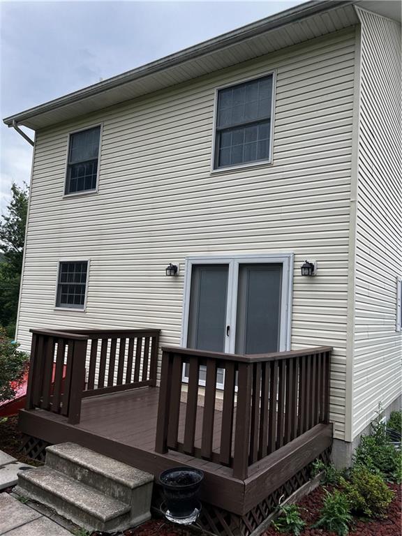 416 Ranch Road Dunbar, PA 15431 - Photo 2 of 25 a view of a house with wooden deck