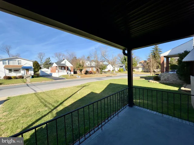 a view of a street from a balcony