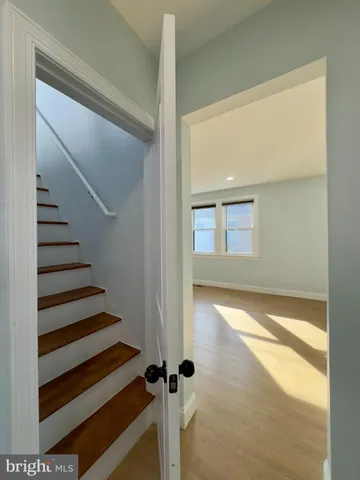 a view of a room with a staircase