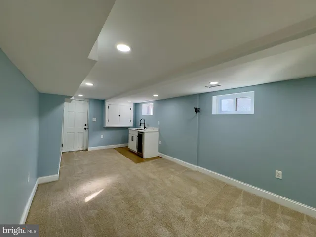 a view of a kitchen with a sink