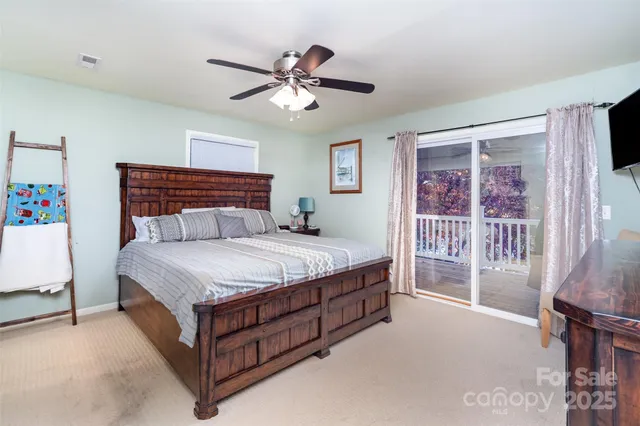 a bedroom with furniture and a window