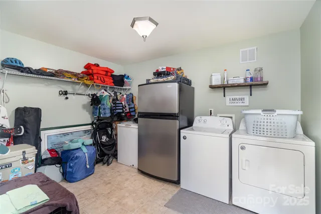 a bathroom with a sink toilet and vanity