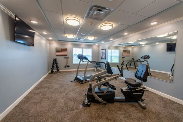 a view of a room with gym equipment