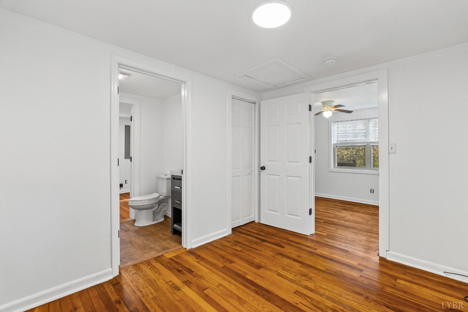 2758 Allens Creek Road Gladstone, VA 24553 - Photo 11 of 25 a view of a bathroom with wooden floor and a sink