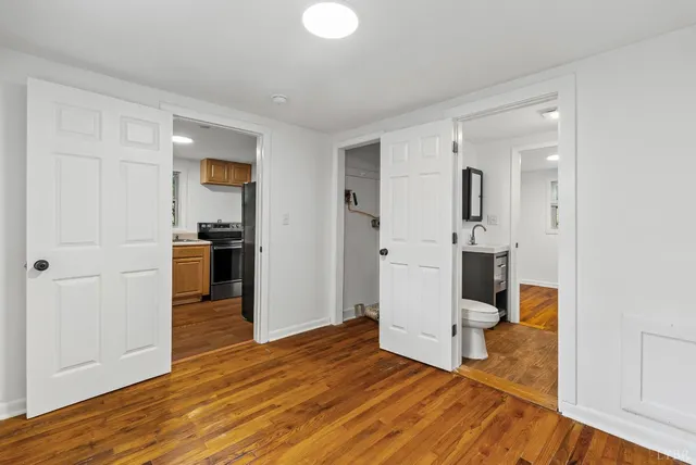 a view of yard with large trees