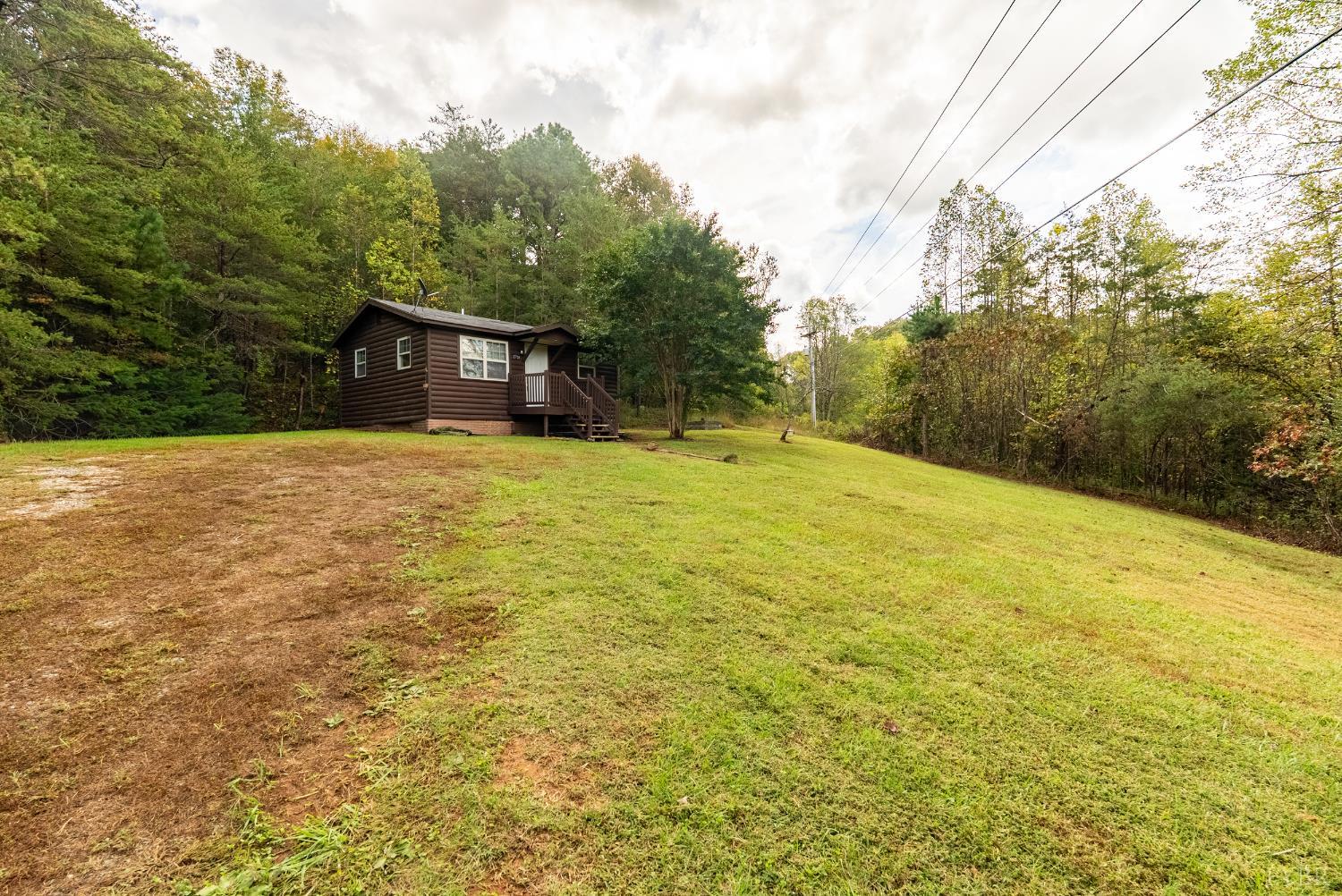 2758 Allens Creek Road Gladstone, VA 24553 - Photo 18 of 25 a view of a yard with a house