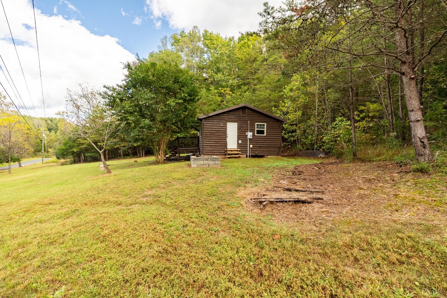 2758 Allens Creek Road Gladstone, VA 24553 - Photo 20 of 25 a view of a house with a yard
