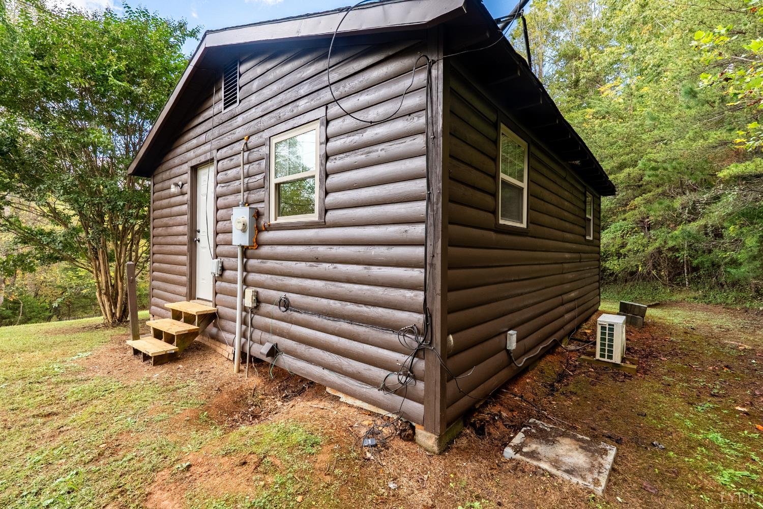 2758 Allens Creek Road Gladstone, VA 24553 - Photo 21 of 25 a view of backyard with a chair and table