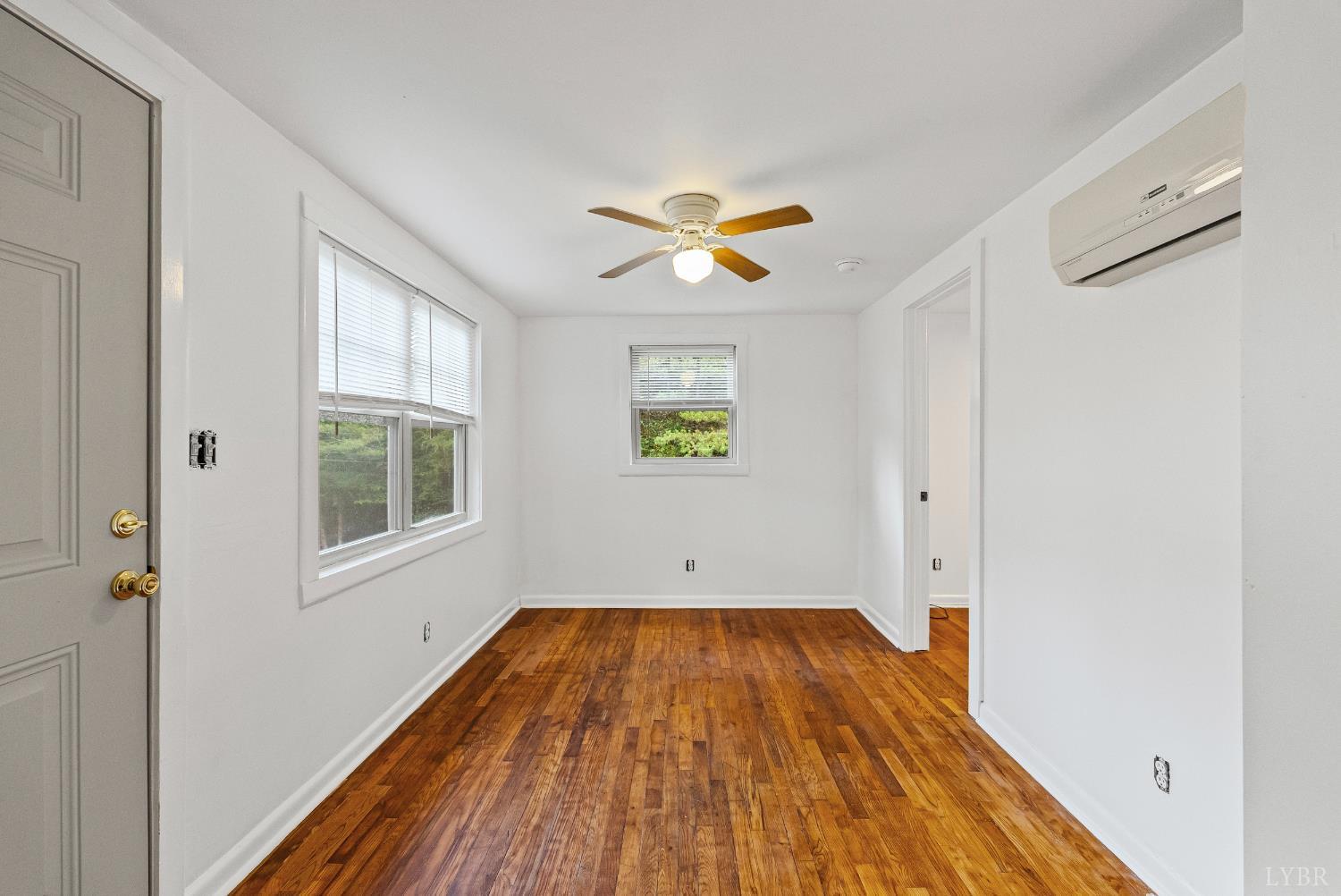 2758 Allens Creek Road Gladstone, VA 24553 - Photo 3 of 25 a view of a room with wooden floor and a window