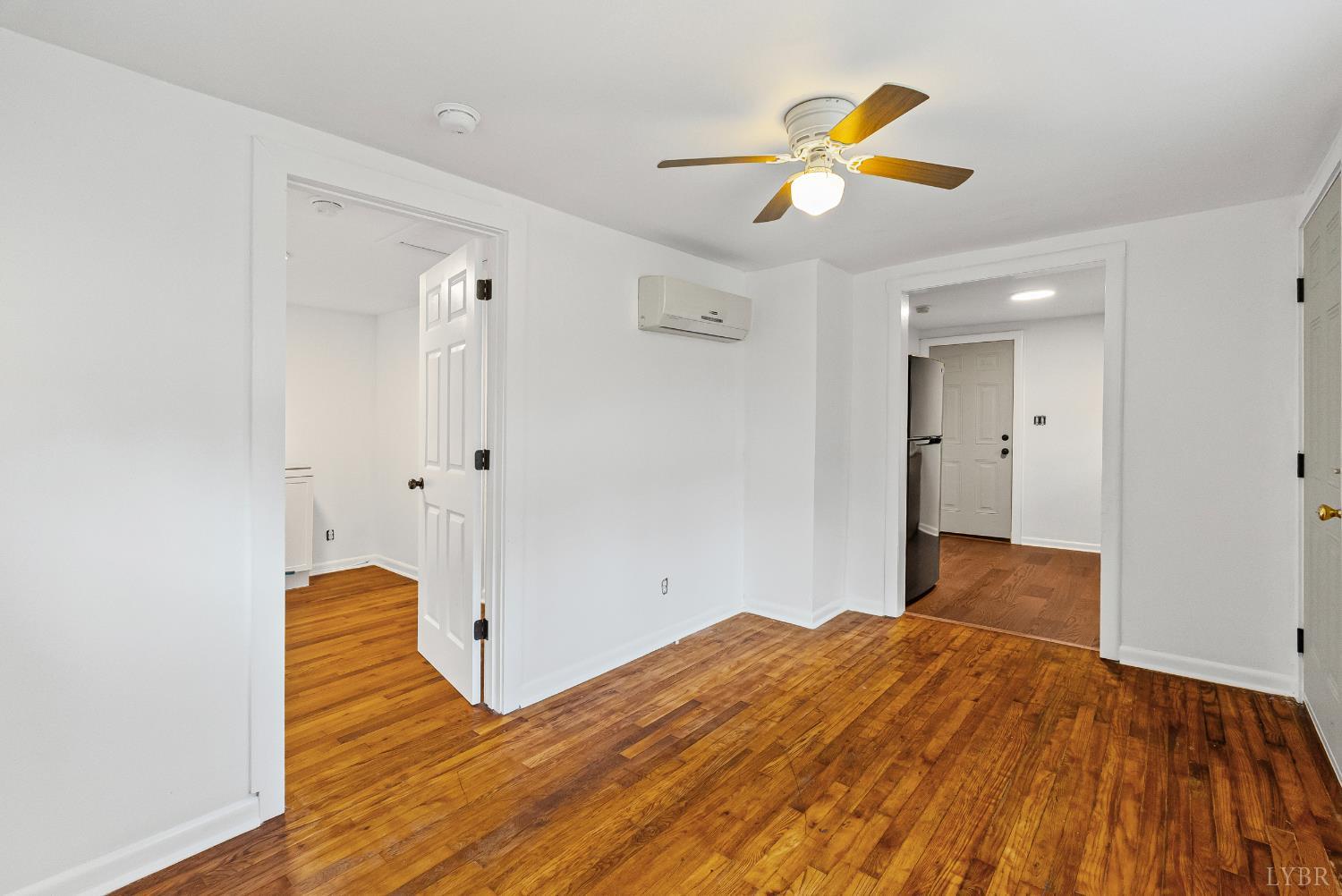2758 Allens Creek Road Gladstone, VA 24553 - Photo 5 of 25 a bedroom with a bed and a ceiling fan
