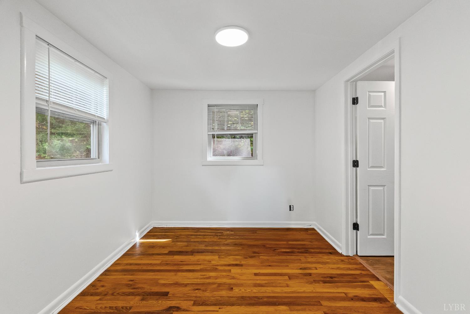 2758 Allens Creek Road Gladstone, VA 24553 - Photo 10 of 25 a view of a room with wooden floor and window