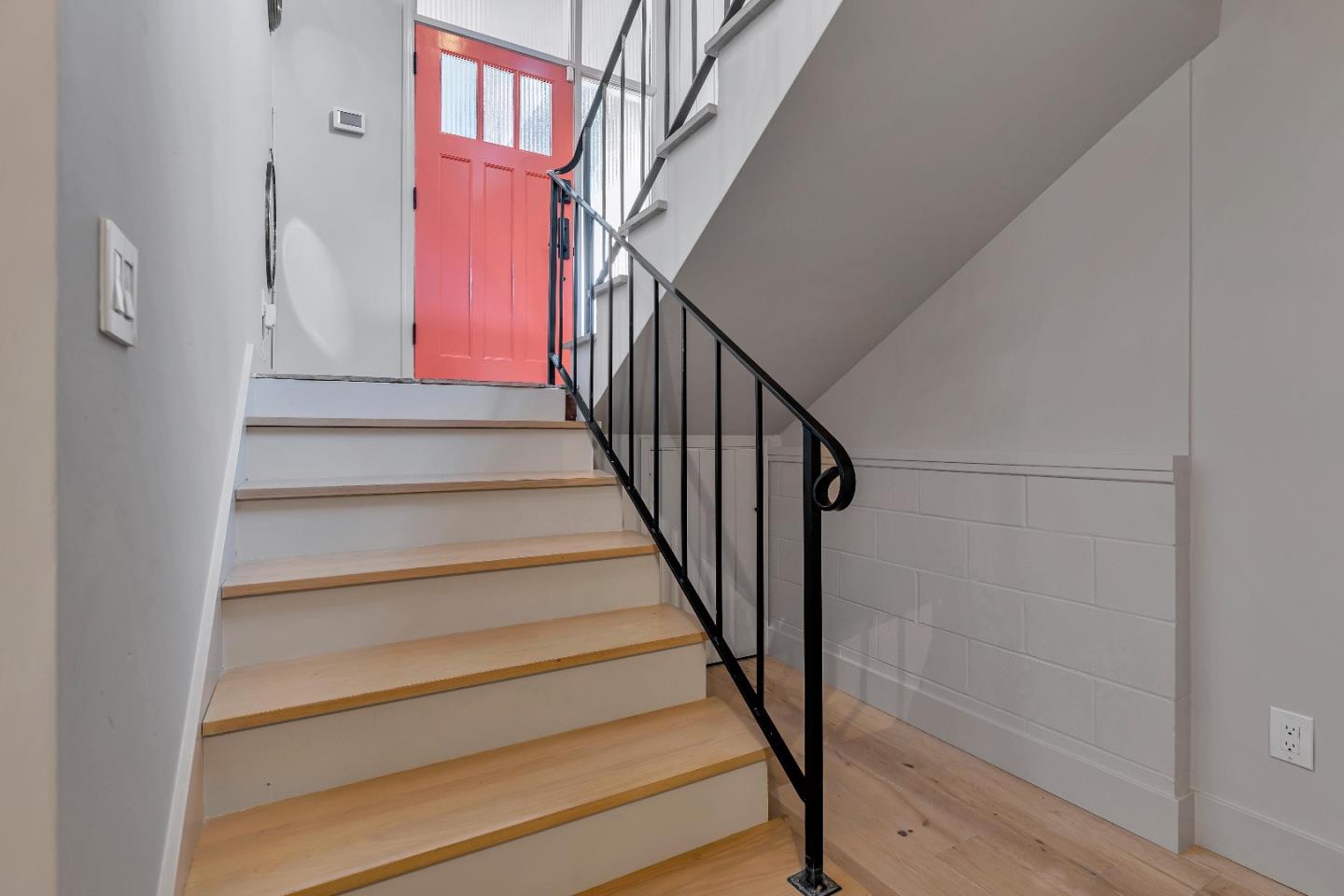 225 Treasure Island Drive Aptos, CA 95003 - Photo 11 of 63 a view of staircase with wooden floor and white walls