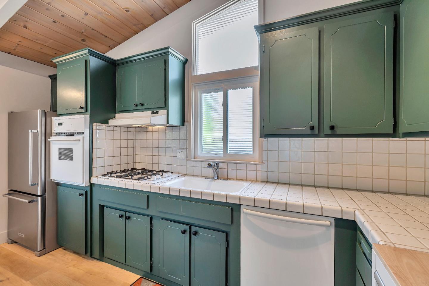 225 Treasure Island Drive Aptos, CA 95003 - Photo 22 of 63 a bathroom with a sink and a mirror