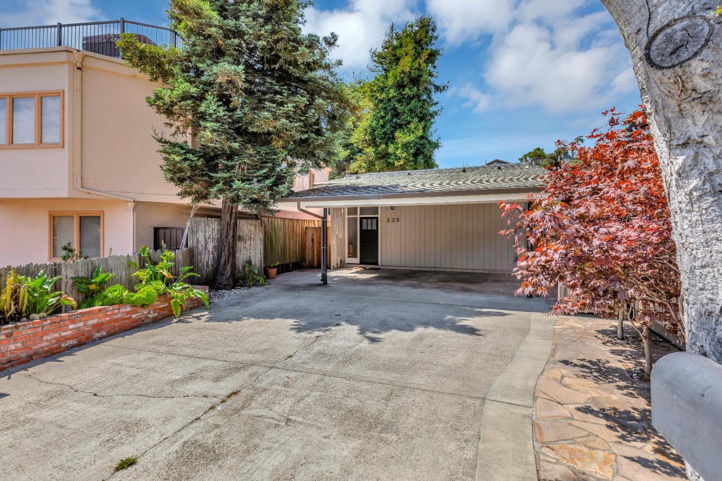 225 Treasure Island Drive Aptos, CA 95003 - Photo 24 of 63 a view of a house with a garden