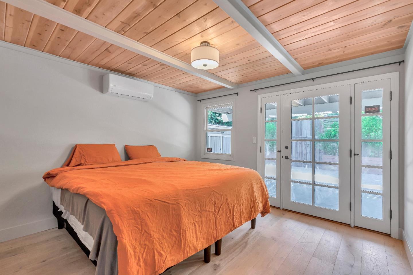 225 Treasure Island Drive Aptos, CA 95003 - Photo 33 of 63 a bed sitting in a spacious bedroom next to a window