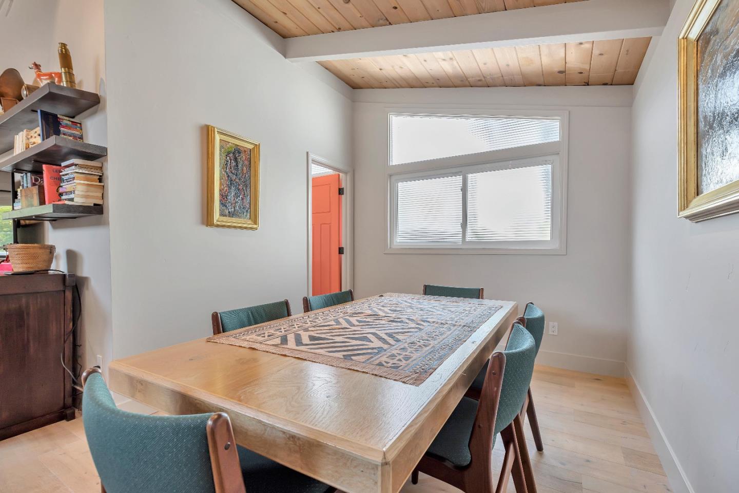 225 Treasure Island Drive Aptos, CA 95003 - Photo 36 of 63 a dining room with a table and chairs