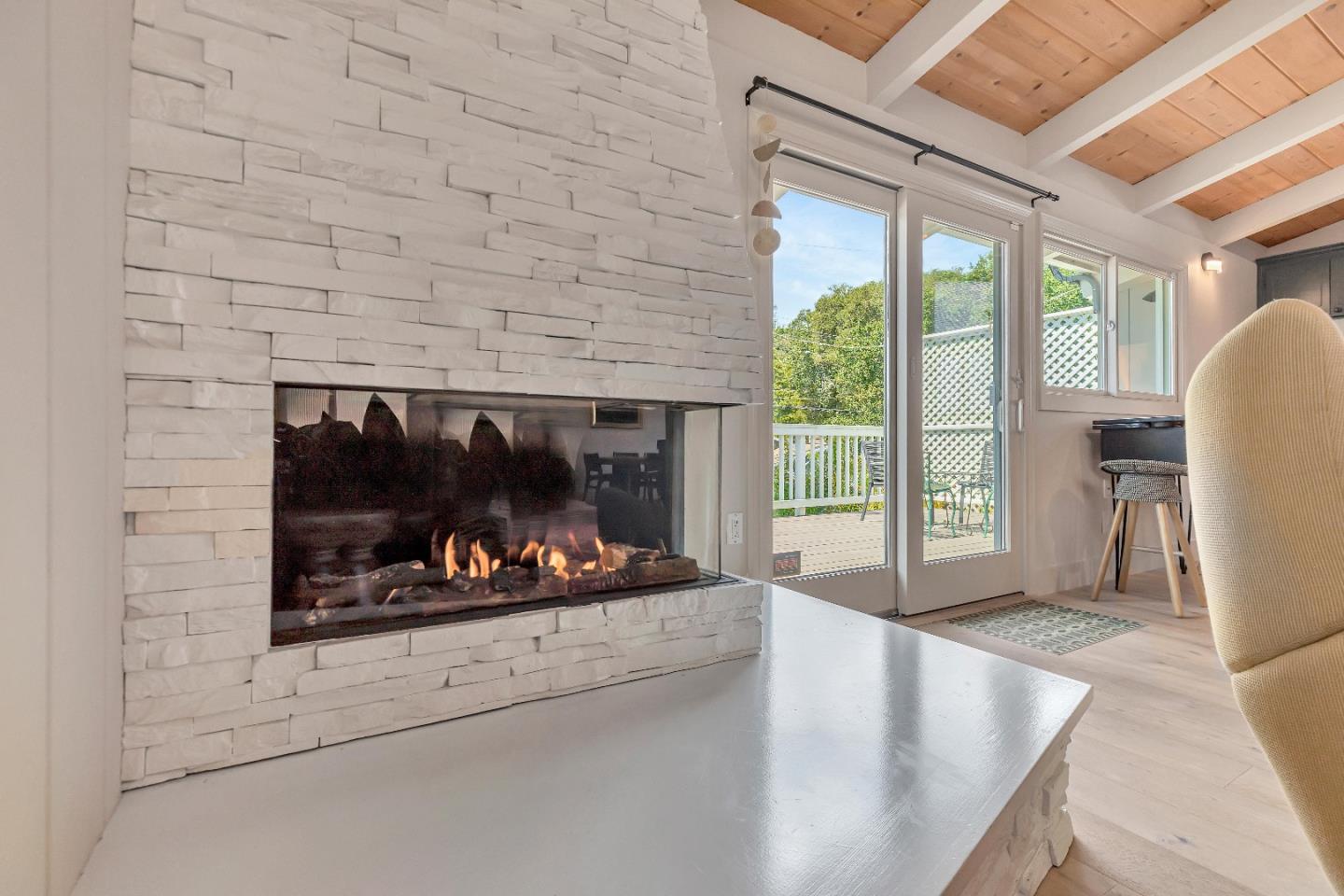 225 Treasure Island Drive Aptos, CA 95003 - Photo 42 of 63 a living room with furniture and a fireplace
