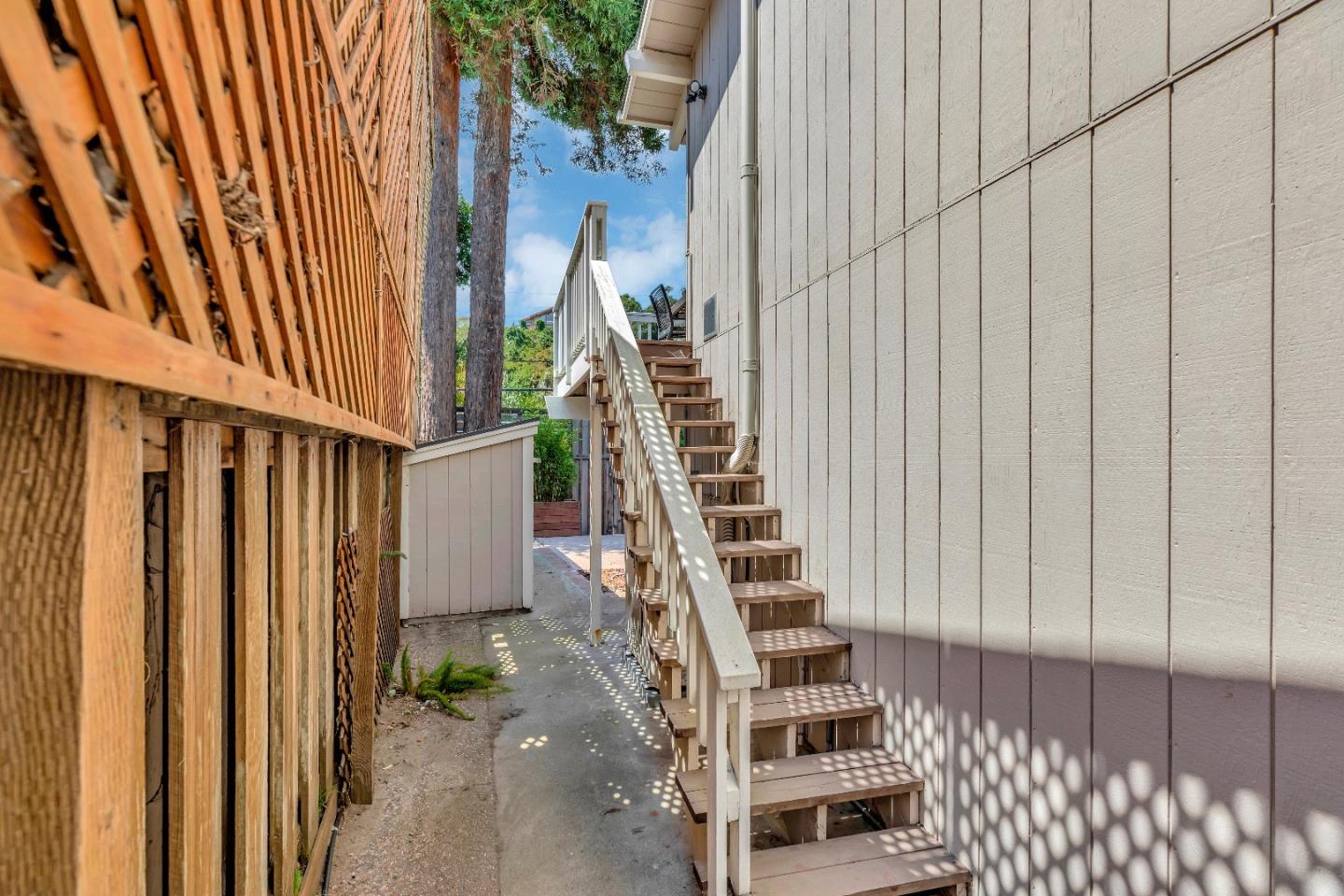 225 Treasure Island Drive Aptos, CA 95003 - Photo 7 of 63 a view of staircase with railing and white walls