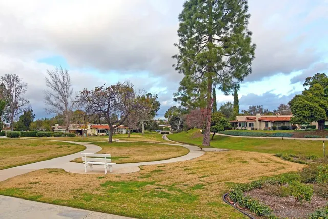 a view of a swimming pool yard and lake view