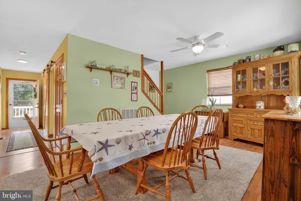 a view of a dining room with furniture