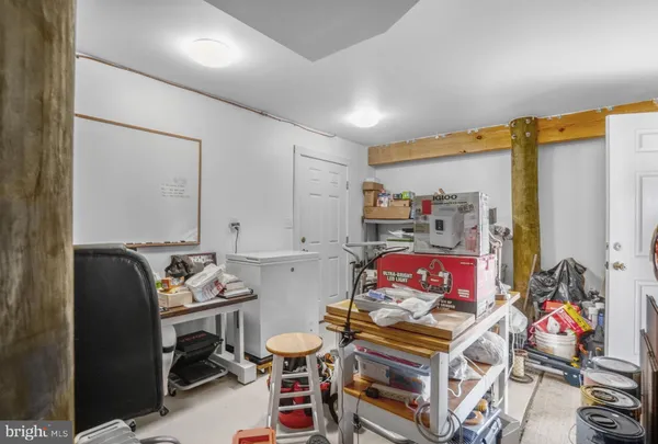a outdoor space with the couches and dining table with the garden view