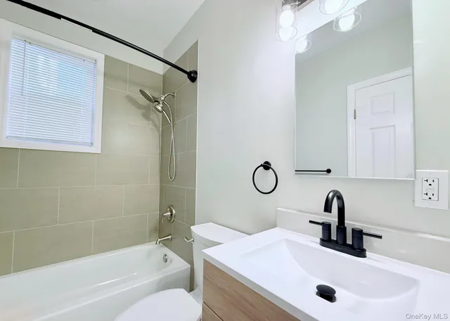 a bathroom with a sink and a tub