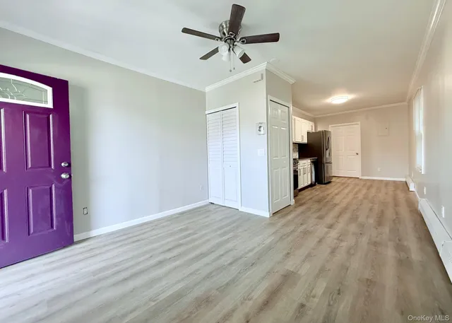 a view of a livingroom with a workspace