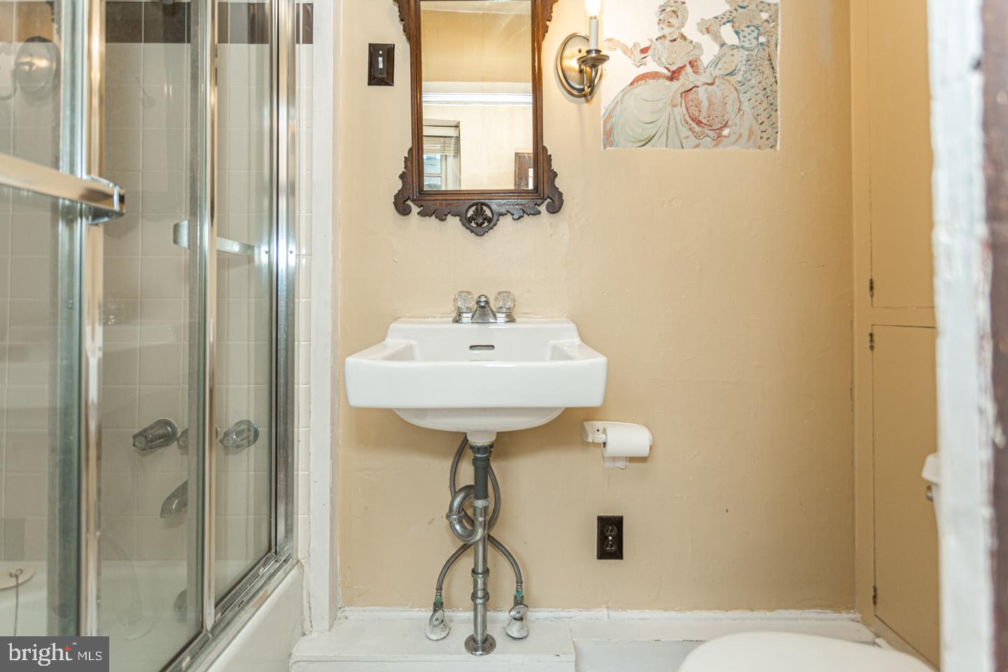 4 West Mechanic Street New Hope, PA 18938 - Photo 17 of 36 a bathroom with a sink a mirror and a shower