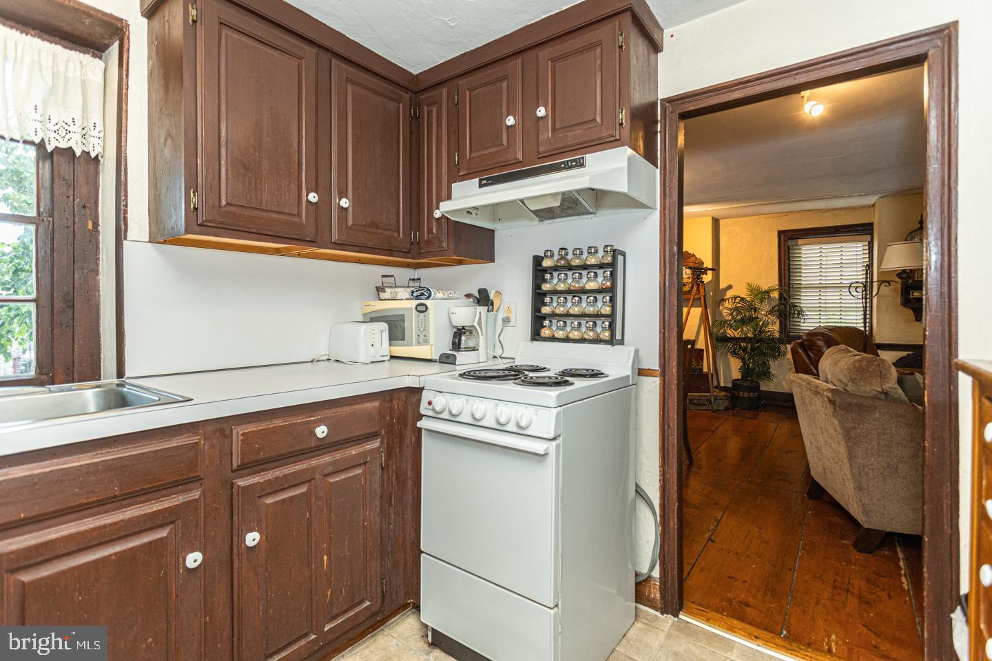 4 West Mechanic Street New Hope, PA 18938 - Photo 23 of 36 a kitchen with a refrigerator and a sink