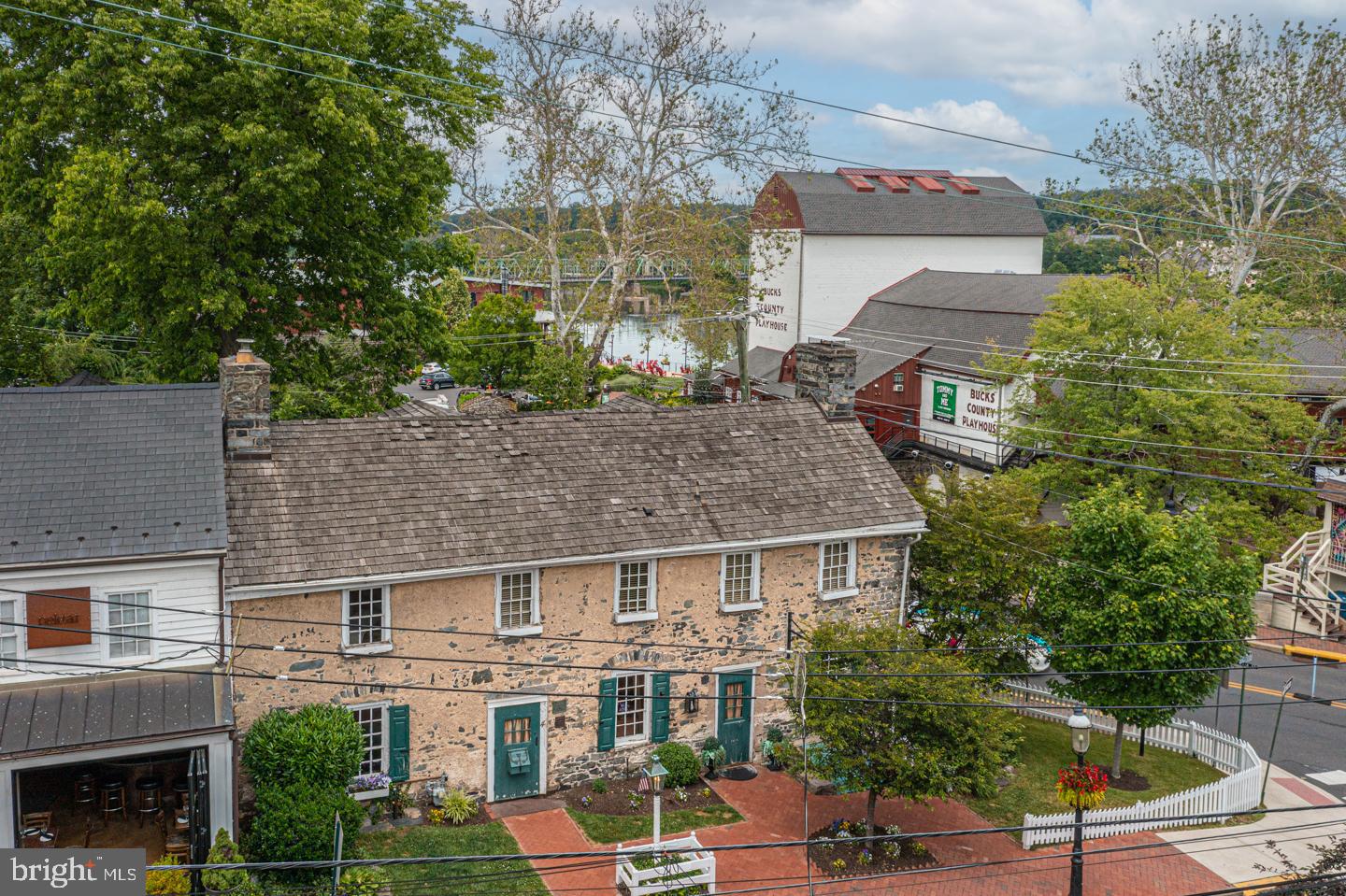 4 West Mechanic Street New Hope, PA 18938 - Photo 35 of 36 a aerial view of a house with a yard and potted plants