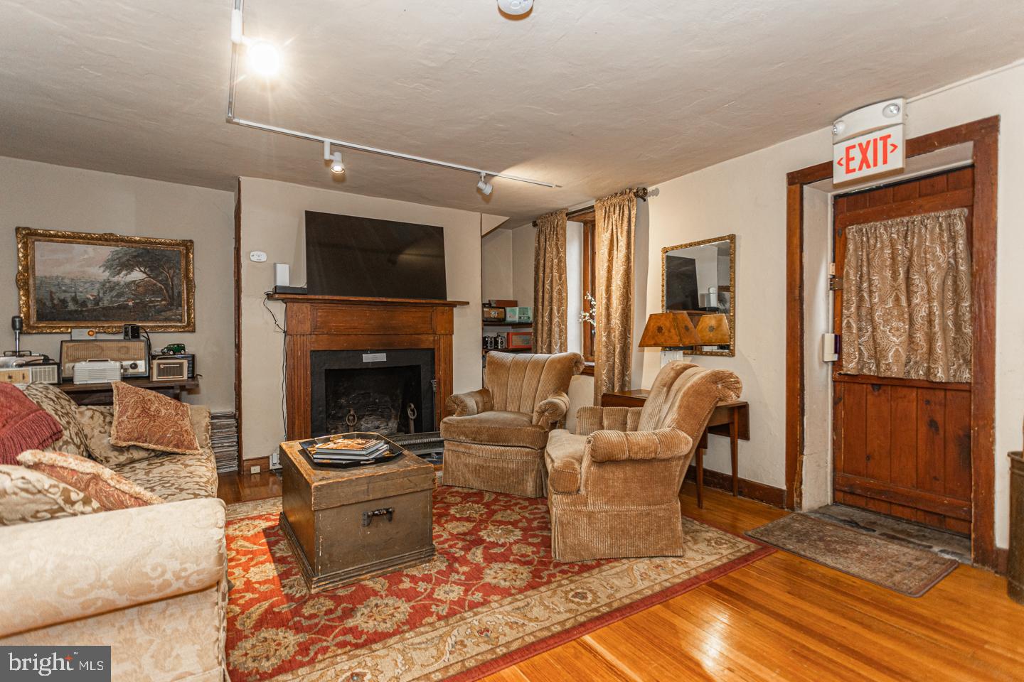4 West Mechanic Street New Hope, PA 18938 - Photo 4 of 36 a living room with furniture and a fireplace