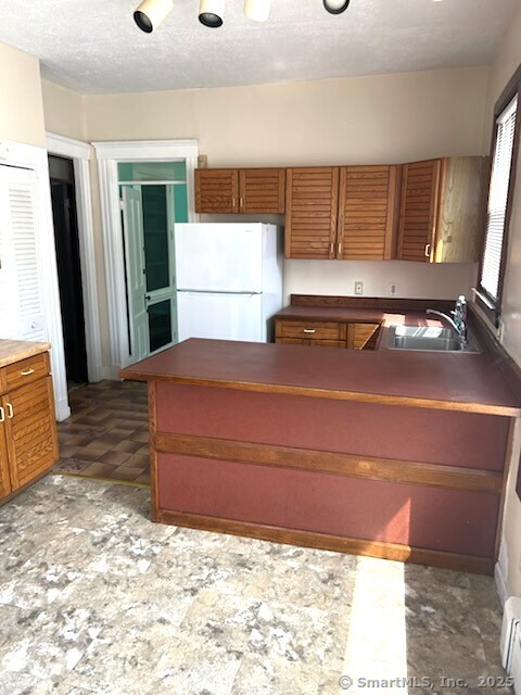 104 Howard Avenue New Haven, CT 06519 - Photo 5 of 9 a bedroom with a bed and a flat screen tv