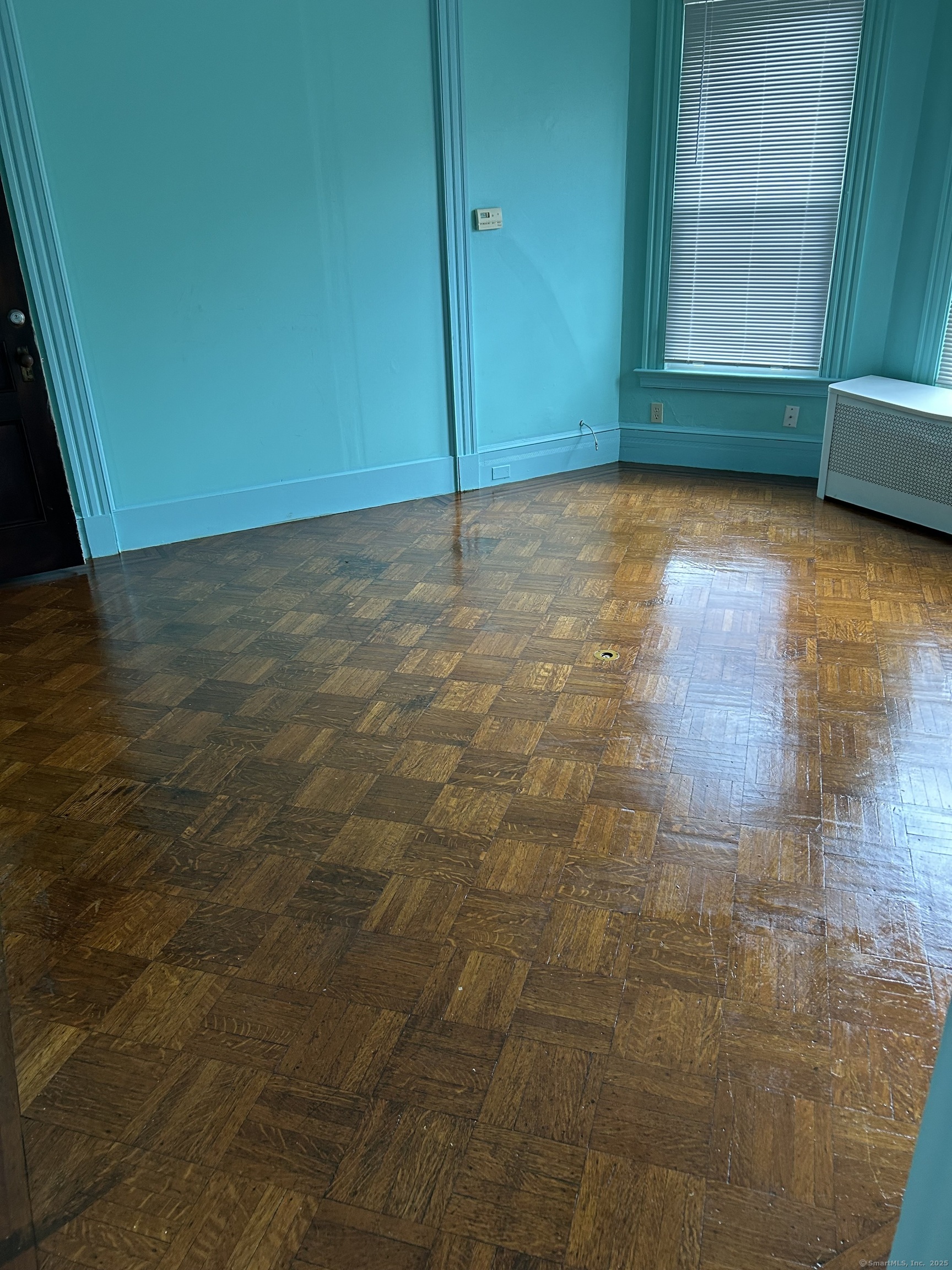 104 Howard Avenue New Haven, CT 06519 - Photo 9 of 9 a view of a room with wooden floor