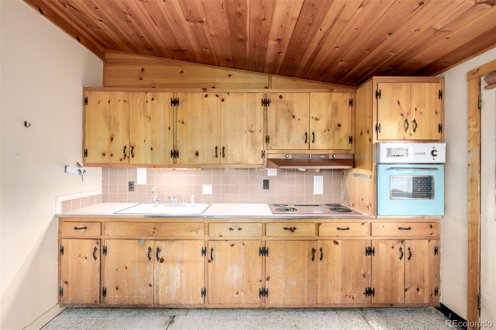7105 Flagstaff Road Boulder, CO 80302 - Photo 12 of 45 a kitchen with stainless steel appliances granite countertop a sink window and cabinets