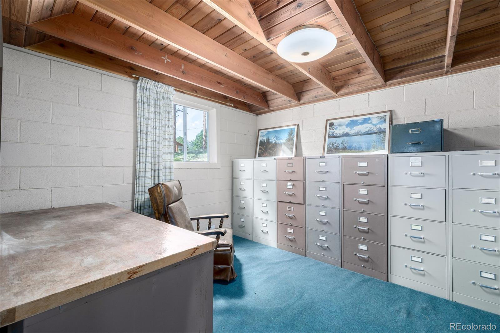 7105 Flagstaff Road Boulder, CO 80302 - Photo 18 of 45 a view of a bedroom with windows