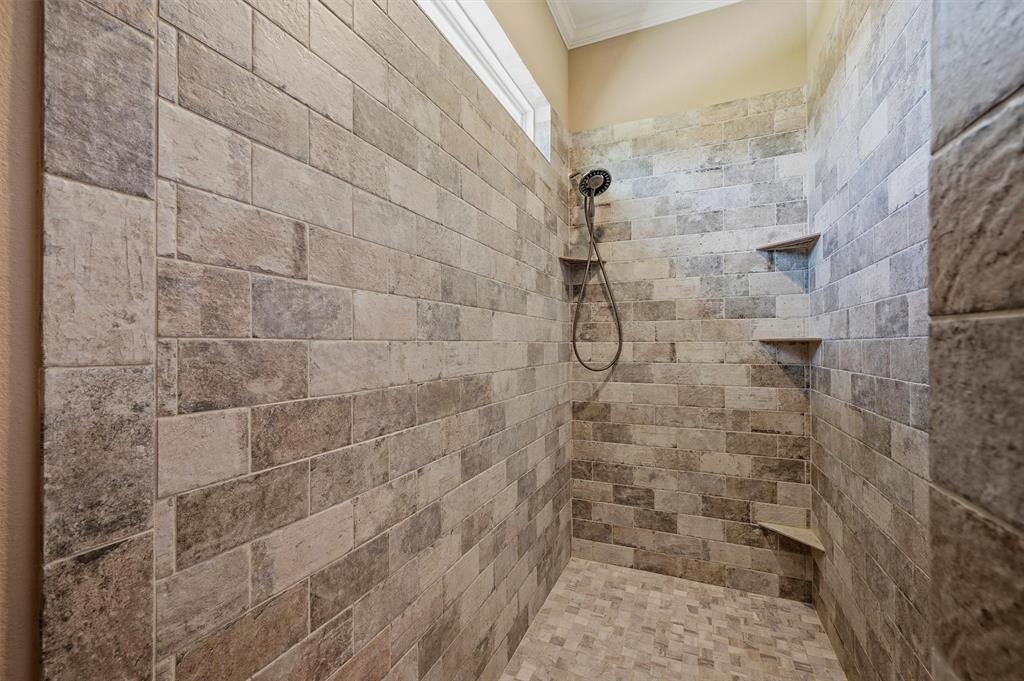 662 Preakness Place Road Van Alstyne, TX 75495 - Photo 16 of 39 a bathroom with a shower
