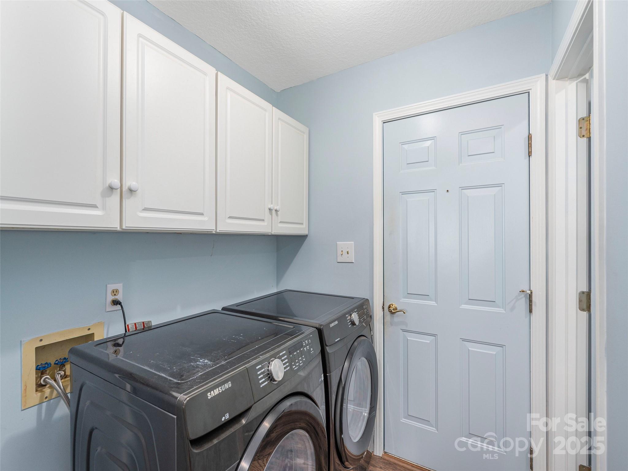 187 Turtle Creek Road Sylva, NC 28779 - Photo 12 of 36 a utility room with dryer and washer