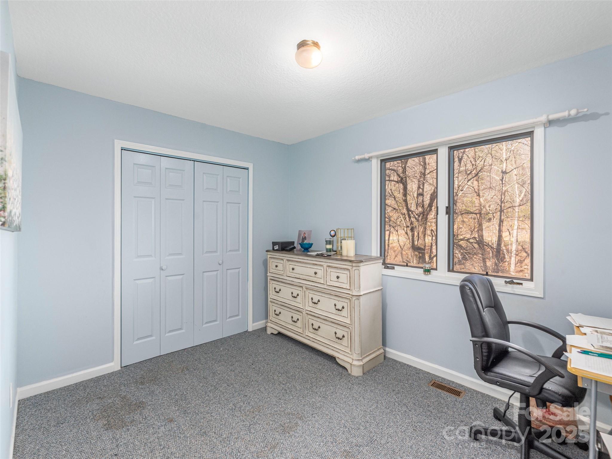 187 Turtle Creek Road Sylva, NC 28779 - Photo 19 of 36 a room with a workspace